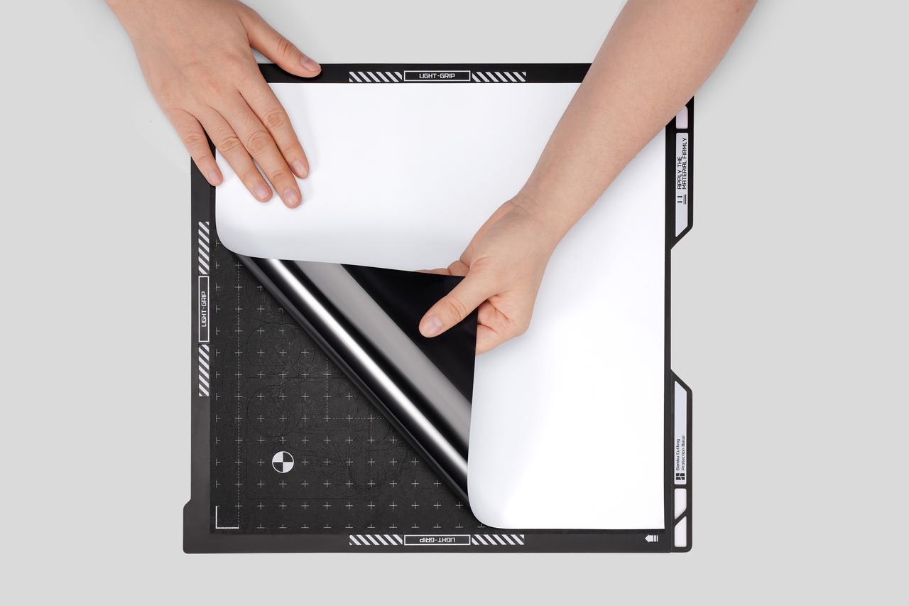 Use a LightGrip cutting mat, with cutting side up and ironing side down;